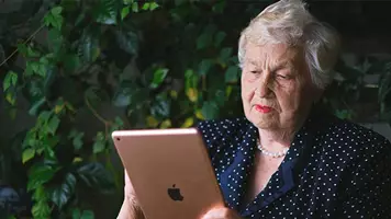 02 Senior Female Using Ipad